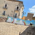 In Piazza del Cinquecentenario a Cerignola un murales ed una scalinata arcobaleno