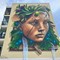 Un murales internazionale illumina la periferia: l’arte green inaugura il Festival dell’Ambiente